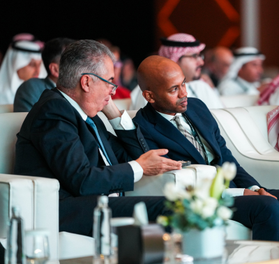 Panel speakers interact on stage at MEOS GEO 2023
